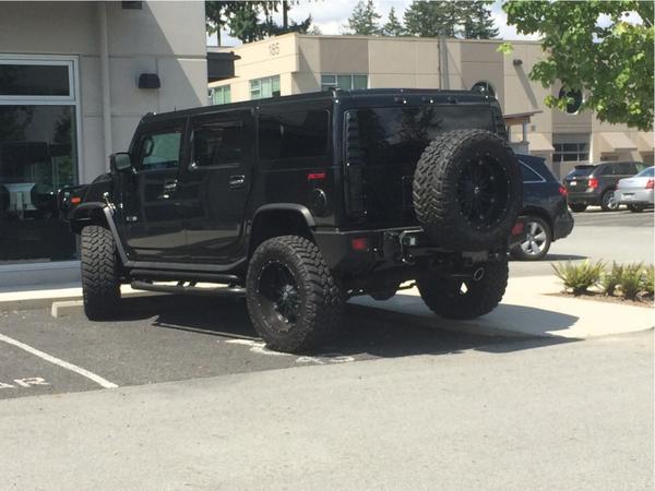 If you’re worried that driving a hummer doesn’t make you look like a jerk, you could always park it like this.