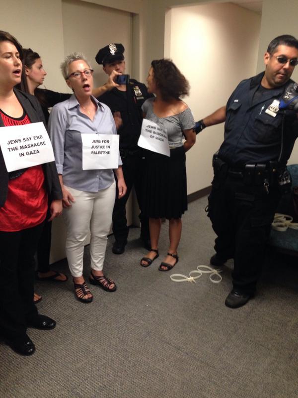 jvplive's tweet image. NOW: Jewish activists being arrested for protesting Israel's #Gaza slaughter at @FIDF office in NYC