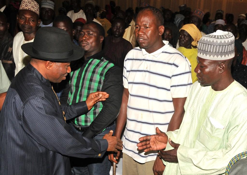 President Jonathan interacting with parents of abducted Chibok girls at the State House today