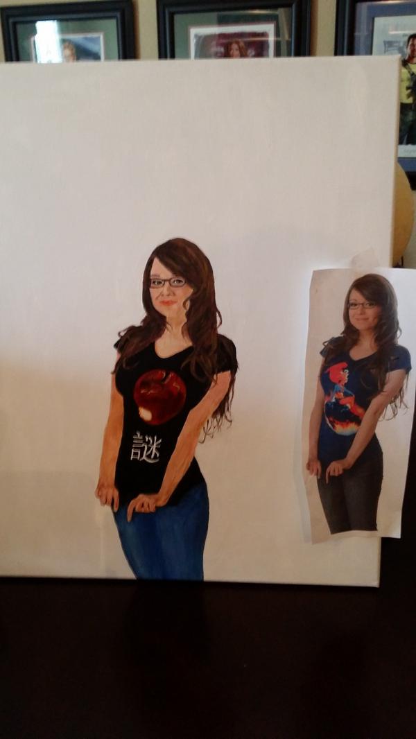 Treb's tweet photo. @Ridd1e the newest painting in the Riddle line from my dad. He hopes you like it. The Chinese on the shirt is Riddle. http://t.co/UoAG9cIphe