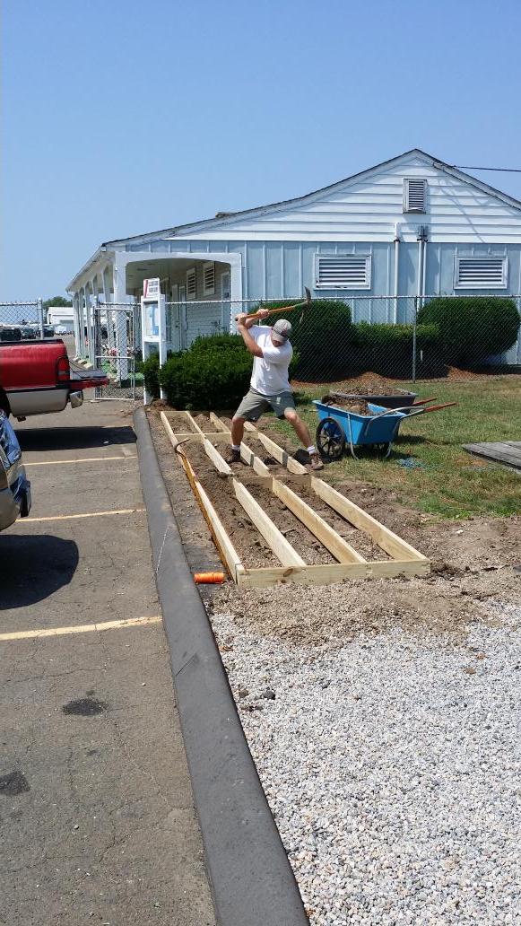 CedarIslandCT's tweet photo. The man, the myth,  the legend, Craig doing some demo work to prepare for the new flower boxes. #cim #clinton http://t.co/uIP82y9Xt7