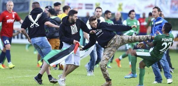 Maccabi Haifa players are attacked by an Anti-Israel mob during a friendly against Lille tonight