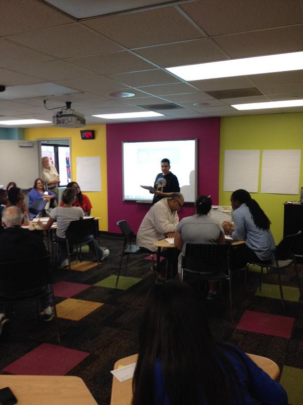 iPrepMath's tweet image. Day 4: Teachers presenting a #carnegielearning textbook lesson to their peers via a fish bowl activity.