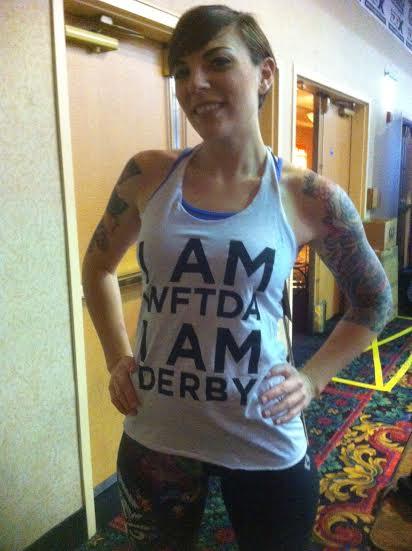WFTDA's tweet photo. Spotted at #rollercon2014: @rachtilldeath in a limited edition WFTDA tank. Get yours at our booth - Royale entrance! http://t.co/h4cCvFgJ5b