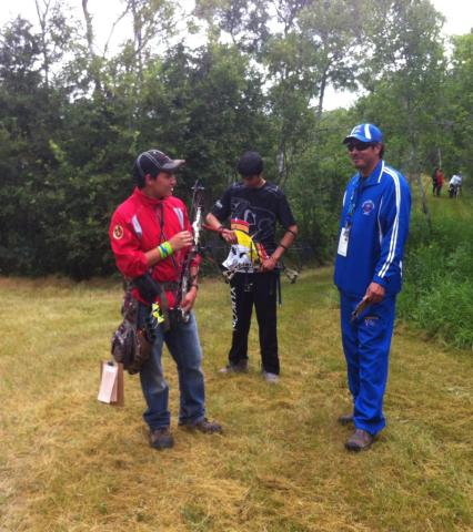 Daniel <a href="/OntNAIG/">NAIG Team Ontario</a> Team Ontario archer 3D competitor chats with score keeper.