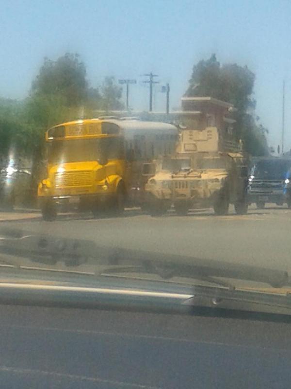 Andycoli619's tweet photo. Basically a death machine next to a bus with kids :)
Kind weird http://t.co/BdQgr9l5hJ