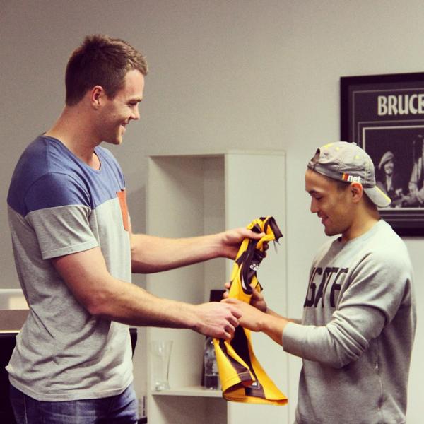 HawthornFC's tweet photo. A special moment as premiership Hawk Max Bailey presents the number 39 guernsey to debutant @AlexWoodward39 #ALWAYS http://t.co/RWXjEz502g