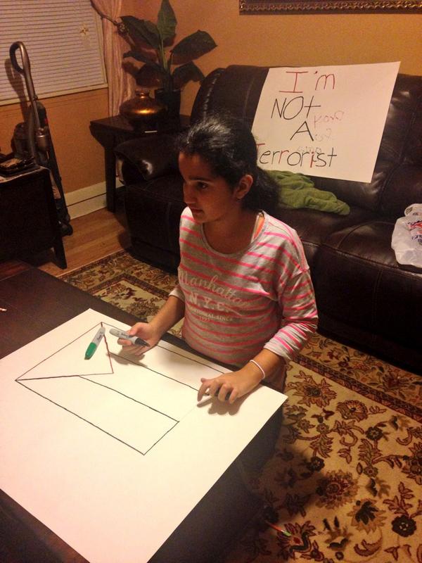 lsarsour's tweet photo. My daughter making posters for a pro-Palestine rally. Look at the sign behind her. Breaks my heart. #SupportGaza http://t.co/M6xNAgUemK