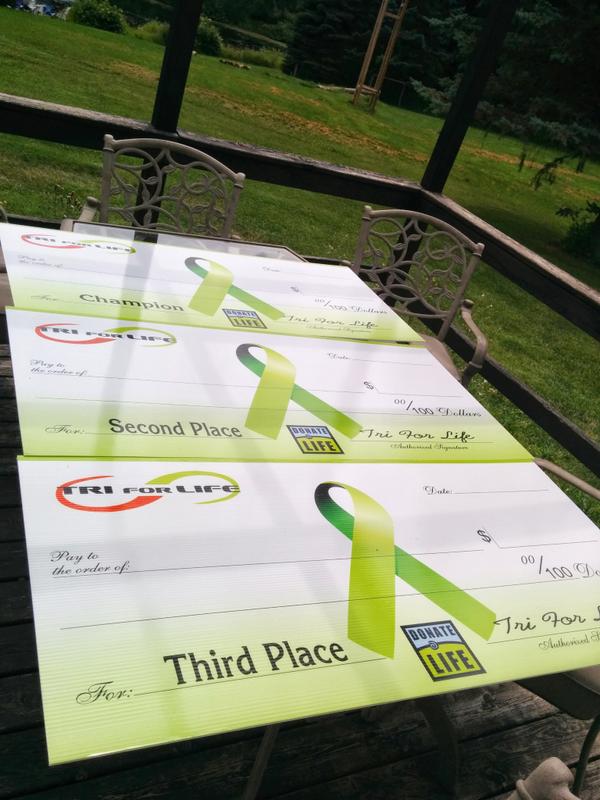 tflevents's tweet photo. @ProTriathletes Checks are ready! Top 3 males and females.  $2500-1st, $1000-2nd, $500-3rd.  http://t.co/juS52m8aqS http://t.co/g9QWWy876c