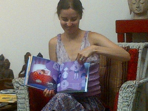 MaryBeierle's tweet photo. Emily reading her children's book, The Rainbow Week, at the Buddhamouse in Claremont, CA http://t.co/EIQpZlMDTP