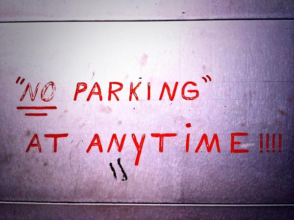 vatrips's tweet photo. Altavista: "No Parking" At Any Time sign on a downtown garage door. #handmade http://t.co/JoJL5rqA7t