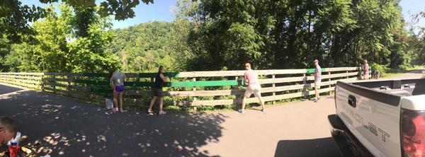 The Morgantown crew is up and at it painting the fence along the Wharf District