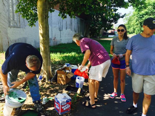 Pouring the paint to make our river front look beautiful! - Morgantown
