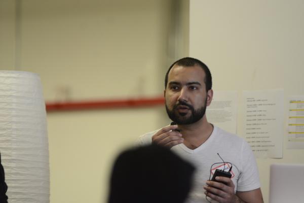 Hackadoge's tweet photo. @Hackadoge Atif Nazir discussing the SoChain API.  #hackadoge http://t.co/zOIlzRnCX1