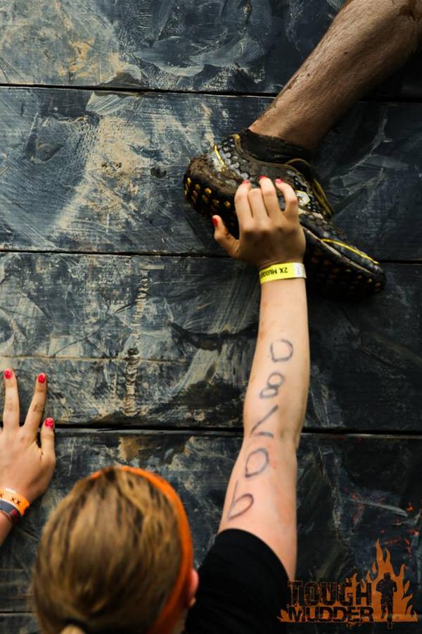 ToughMudder's tweet photo. Retweet if you helped someone over Berlin Walls at your event. #teamwork #noimpropertouching http://t.co/MEsJXwfkyG