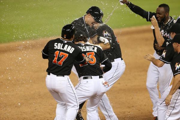 Marlins's tweet photo. AN AMAZING COMEBACK WIN: http://t.co/5GmPibx1cX