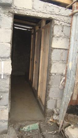YoKibera's tweet image. Each with their own locally crafted wood doors. Our plan was to spend the money locally, within Kibera