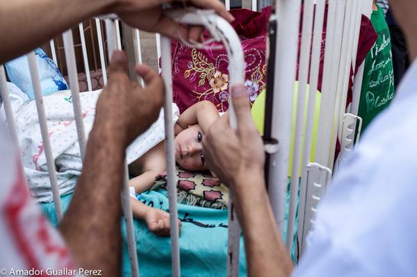 imagawa_new's tweet photo. Those eyes went directly through my soul. A Palestinian girl wounded at the Al-Shifaa Hospital #GazaUnderFire # http://t.co/FGohVKmMEn