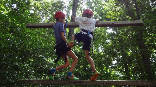 We're all in this together. #Teamwork #CampLife #HighRopes