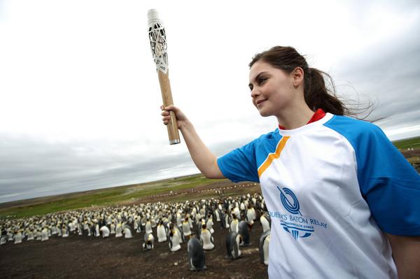 The baton visited the Falkland Islands in Feb. Team Falklands’ Laura Minto was joined by a rookery of king penguins
