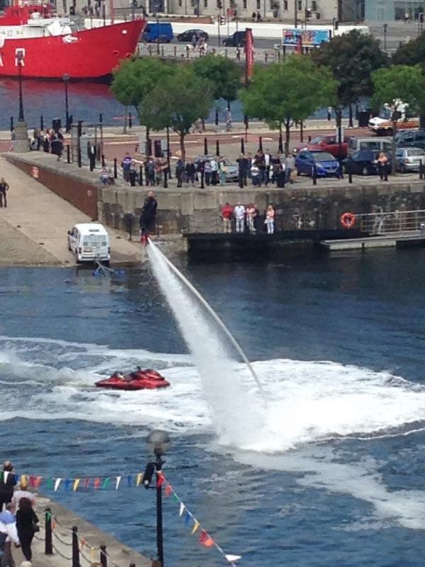 Transactis's tweet photo. From #GiantSpectacle to water jet, view from @Transactis office window here in #Liverpool http://t.co/DHeF4EAG2j