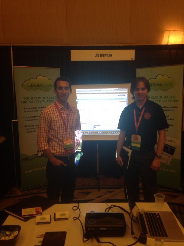LifeSafetyLink's tweet image. Marc, a @lifesafetylink power user at the booth with Ryan. #cshema14 @tamhsc