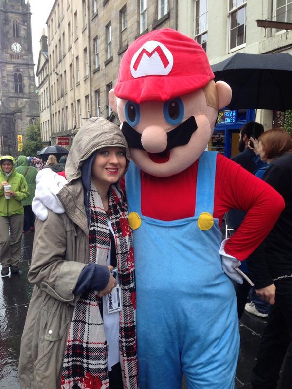 OurPlayJim's tweet photo. @SarahLMutton flyering on a wet and rainy mile- Mario brightened our spirits though!!!! @Lea_Johnson #Jim #edfringe http://t.co/rE4hAf28TQ