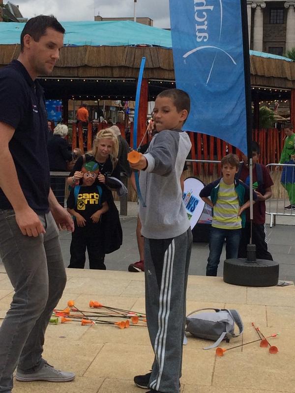 FriendsofEPIC's tweet photo. Our community games children are having a ball in town with @TeamGB Archery and staff @96emmaphillips &amp; @SKoczalski http://t.co/buJWnDe6kp