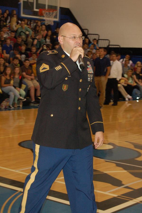 Louisville Preston recruiter Sgt. 1st Class Stephen Langham addresses Spencer Co. High School's student body today.