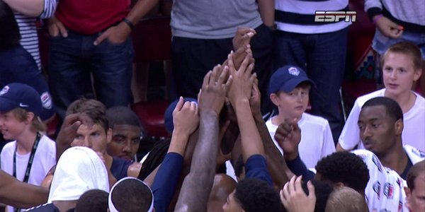 ESPNNBA's tweet photo. USA Basketball players circle up on the court to take a moment for Paul George. http://t.co/MsXxkwaqJ4