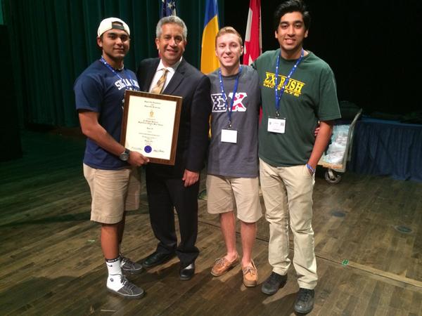 Brothers Dorian Medina, Matthew Mateer and Robby Gill accepting the Peterson award for our chapter at BLTW 2014 IHSV