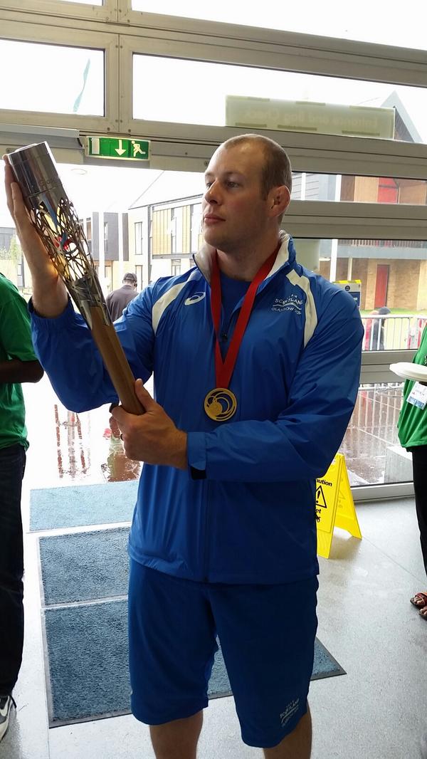 Scottish Royal Marine and judo +100kg gold medallist Chris Sherrington with the baton #BatonRelay #2014judo