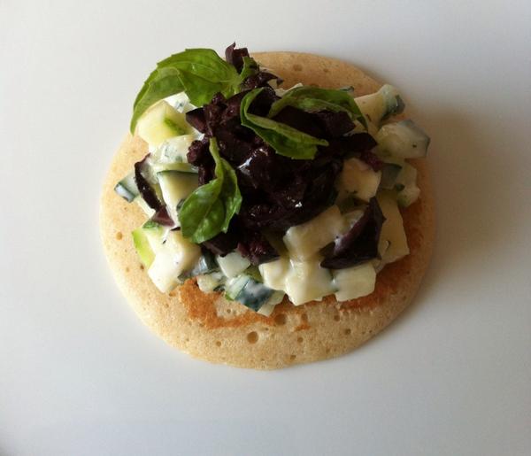 ChefMalerba's tweet photo. #SummerFoodPorn Rye blini topped with cucumbers, zucchini, yogurt, mint, basil and kalam. olive. @ChefMalerba recipe http://t.co/E7nlObYaGU