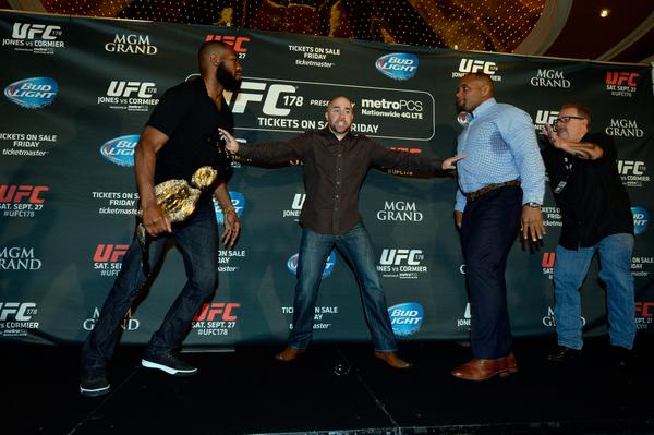 YahooSports's tweet photo. #UFC champion Jon Jones and Daniel Cormier brawl during pre-fight press conference --> http://t.co/ocQ5vqFpVS http://t.co/u0PunQqagu