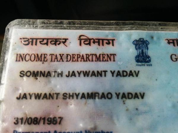 hiyer's tweet photo. Found this pan card lying in a puddle in cotton green. Lets find Somnath and gift him this before his birthday on 31 http://t.co/YM1jbMpb79
