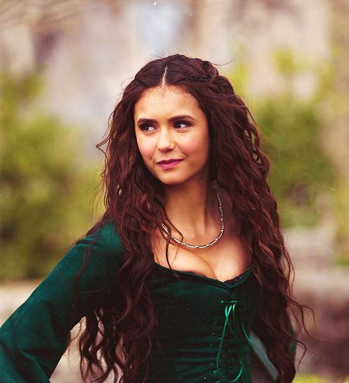 Elizabeth sat on a bench just outside her castle as she ran a hand through her hair. #OpenRp