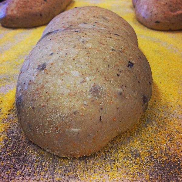 Olive Bread dough proofing overnight to be baked fresh in the morning!