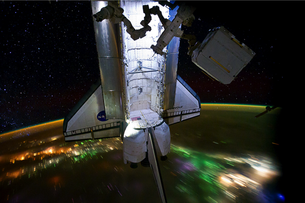 CaptMarkKelly's tweet photo. I took this pic from @ISS_Research of Space Shuttle Endeavour on its final flight. #tbt http://t.co/4WeI3Q18gV