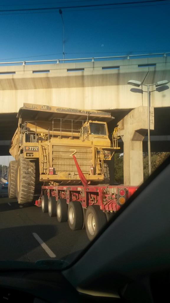 TheRealD3Z's tweet photo. @EWNTraffic truck stuck under bridge http://t.co/2eNCNmvBGR