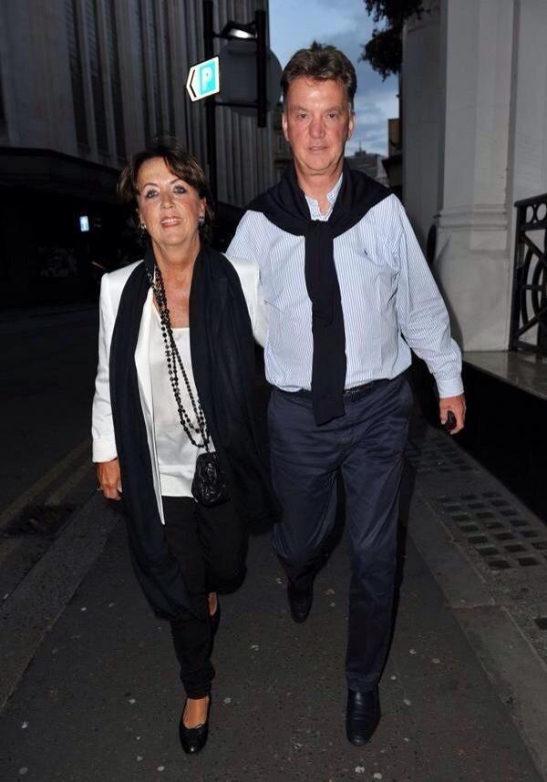 Manchester United manager Louis Van Gaal strolling through Manchester along side his wife #mufc #utd #manutd