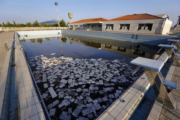 NBCNews's tweet photo. Ghostly Ruins: #Athens2004 Olympic venues, ten years later http://t.co/6s0DxsCG5x http://t.co/SPlVLuFHc2