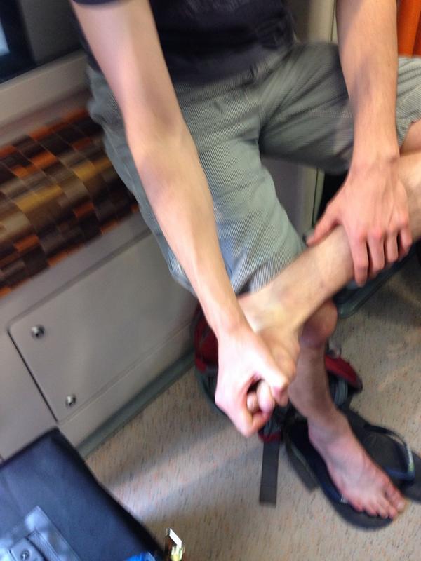 DanYates616's tweet photo. This guy picking his feet on a busy tube; stay classy London! #gross http://t.co/02JHCif2sv