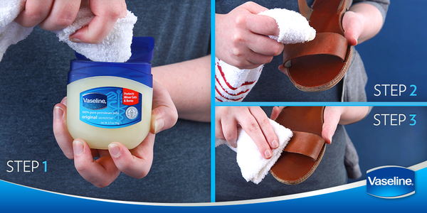 Applying Vaseline and wiping with a cloth to polish leather shoes at home effectively.