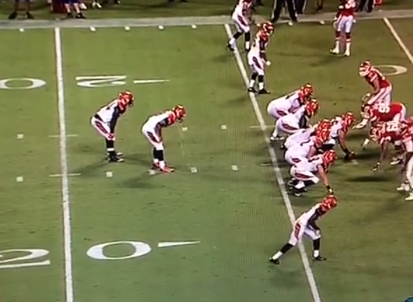 BleacherReport's tweet photo. VIDEO: Bengals QB Matt Scott pukes on the field, then throws a TD pass http://t.co/hLHyXko6LH http://t.co/2skeVzmKqg