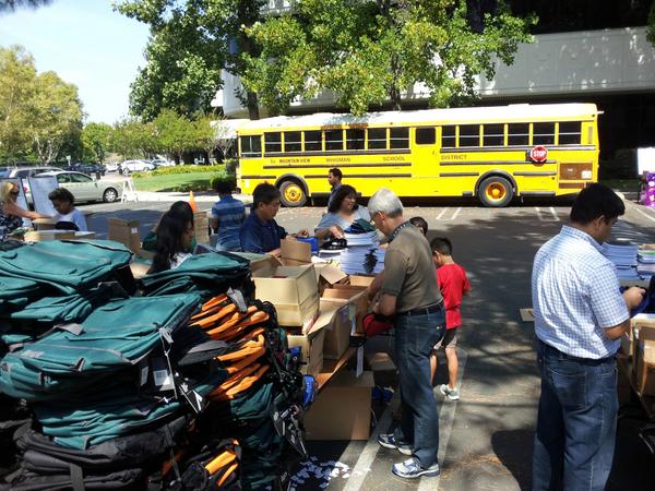 synopsysshares's tweet photo. Getting ready to Stuff the Bus! Synopsys HQ volunteers fill backpacks for local schools. http://t.co/g7SvnKR2za