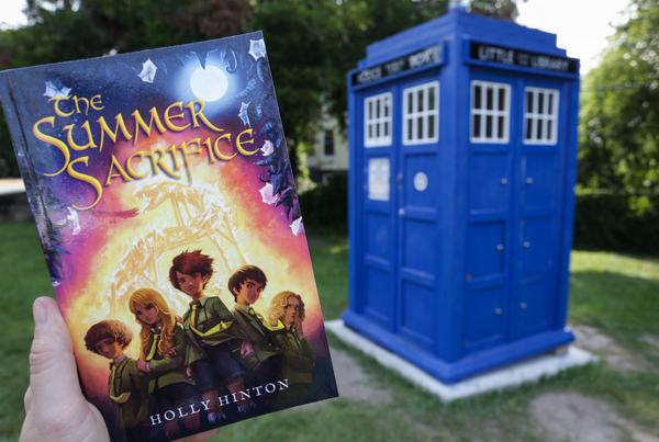 MaryannBates's tweet photo. Loved @HollyHinton1 new book so much that I bought a copy to put in our local TARDIS, a little free library in Macon. http://t.co/B68DuJO4g4