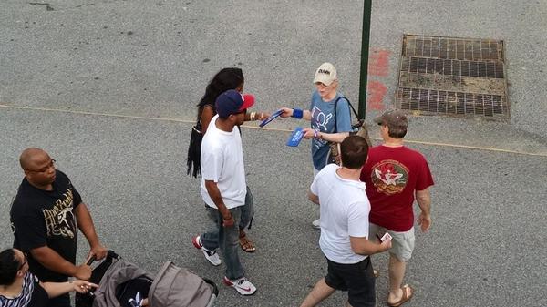 Mary Dunn hands out slappykoozies at credit union #100 celebration <a href="/truckeroo/">Truckeroo</a>