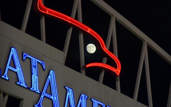 Reds's tweet photo. Tonight’s super moon as seen through the Great American Ball Park scoreboard. http://t.co/GVPSdbSdWA