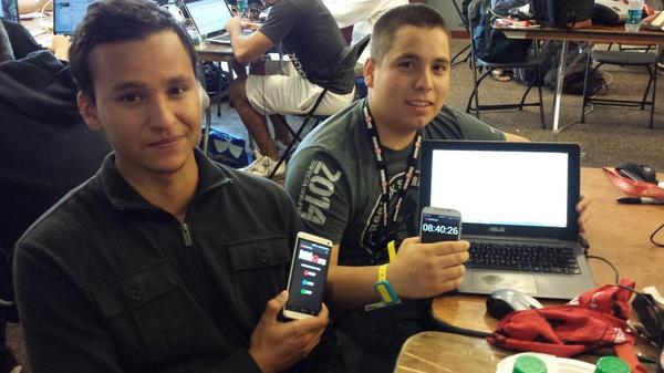 csinthree's tweet image. .@elicubed and @BrianDeAnda2 of Team Unsigned showing off their sweet Android app #spartanhackathon #hackfit