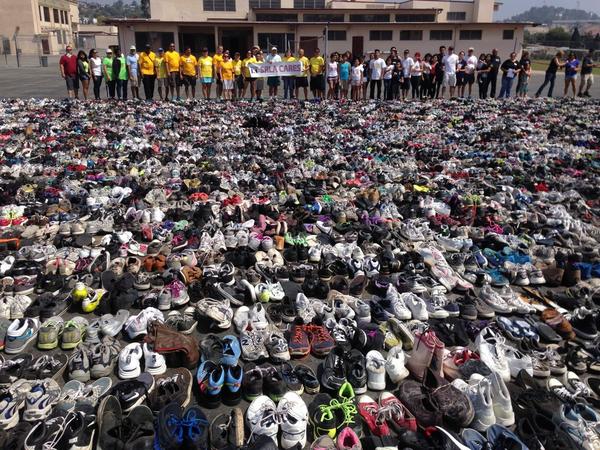 SRLA's tweet photo. We did it!  Broke the #GuinnessWorldRecord for Most Shoes Collected for Recycling!  @gwr @solesforlife http://t.co/xMvHgYC1FE